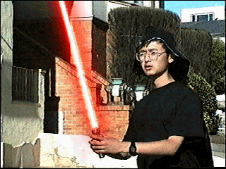 [Ken as Vader with Lightsaber]